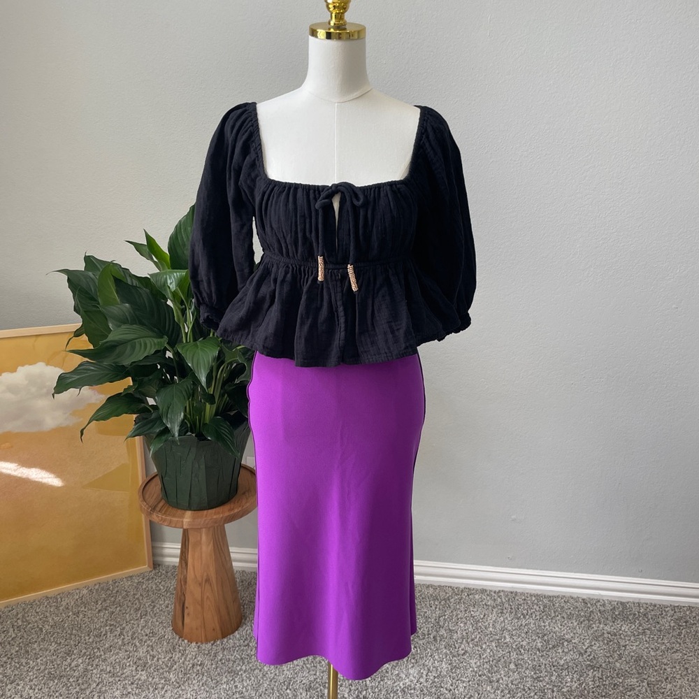 Elegant peplum black top